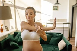 Picture: A pregnant woman is doing light exercises.
